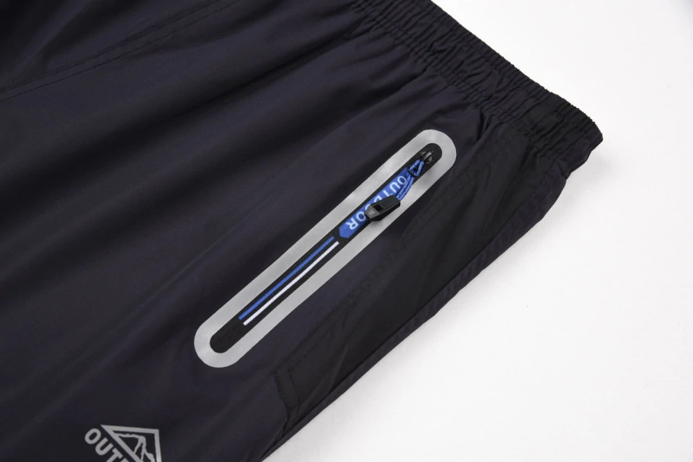 Pánské a dámské zateplené šusťákové kalhoty (M-2XL)